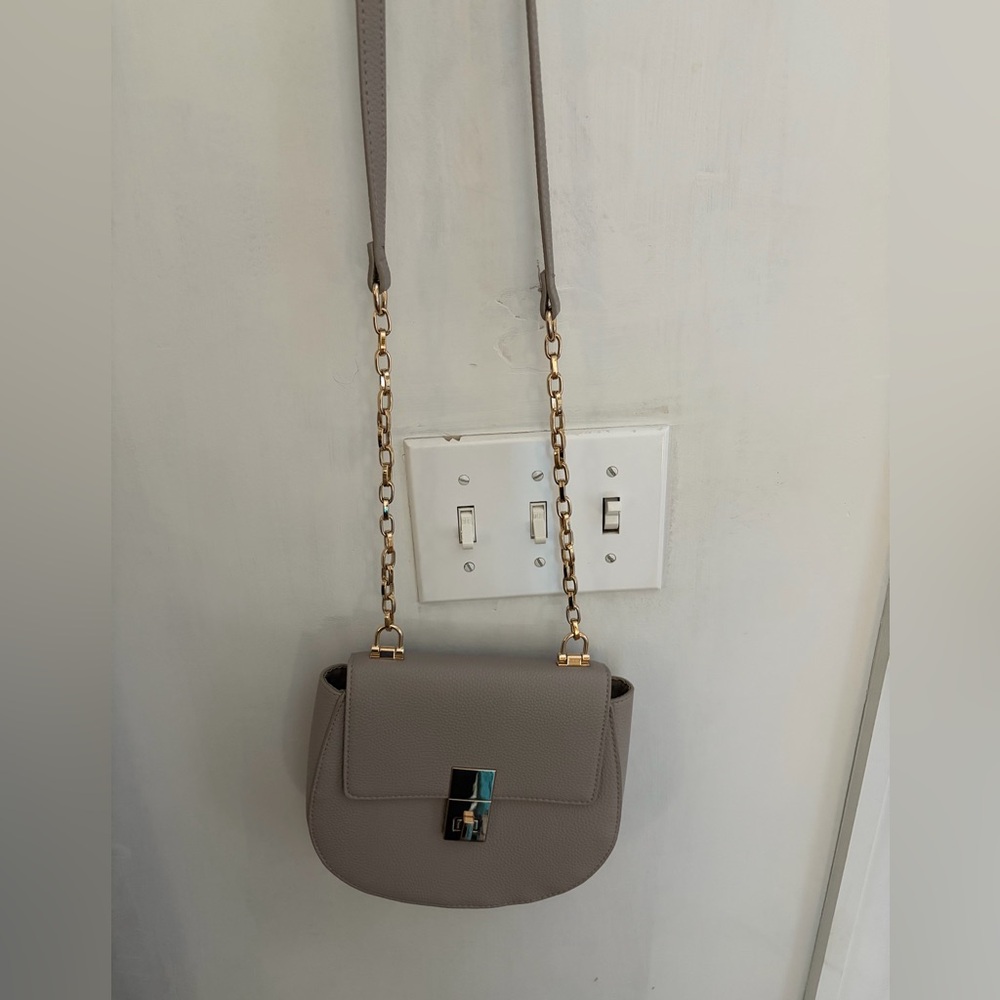 Express shoulder bag. Preowned very good condition. Offers welcome.